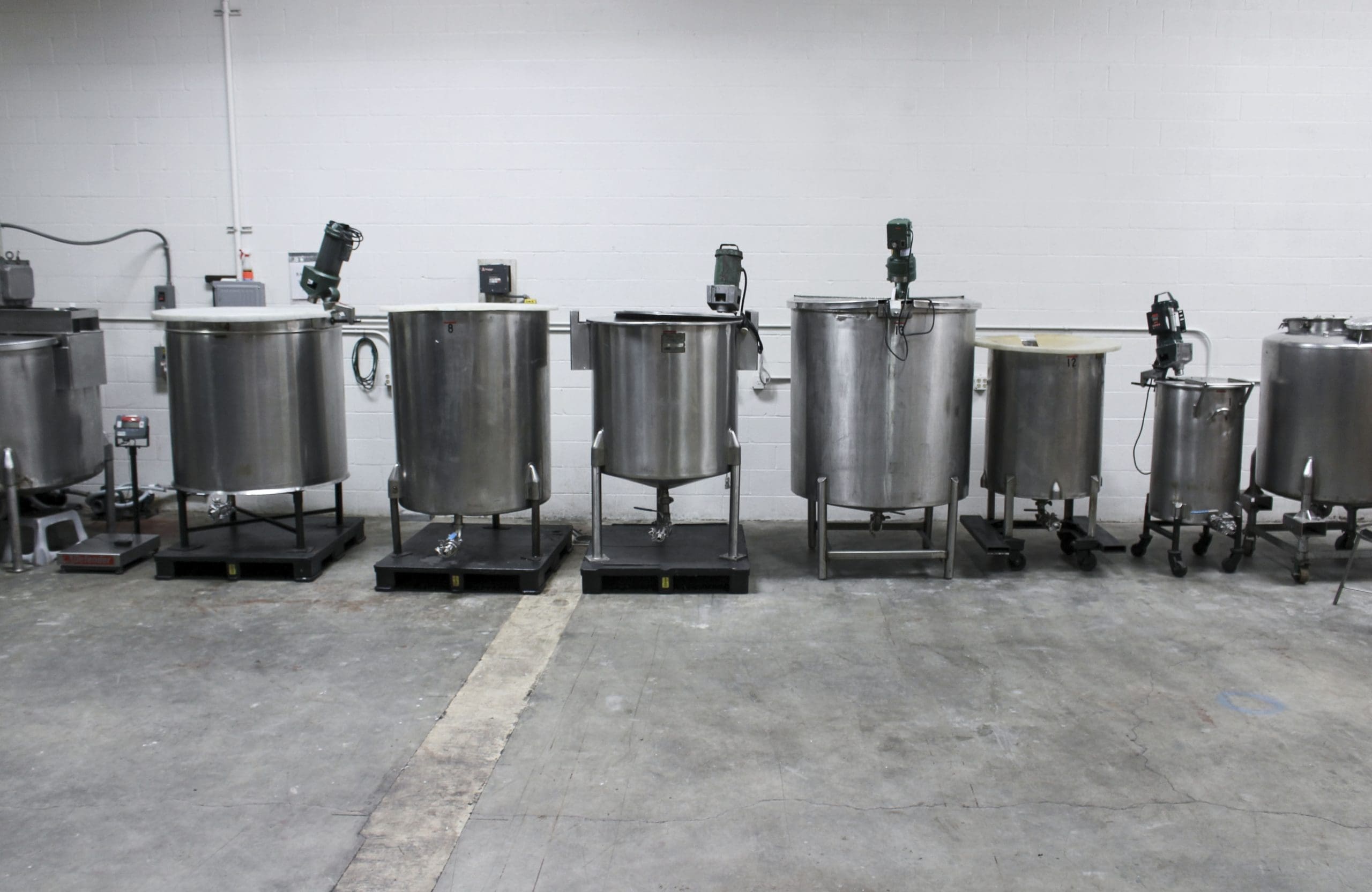 Stainless steel mixing tanks in the production facility